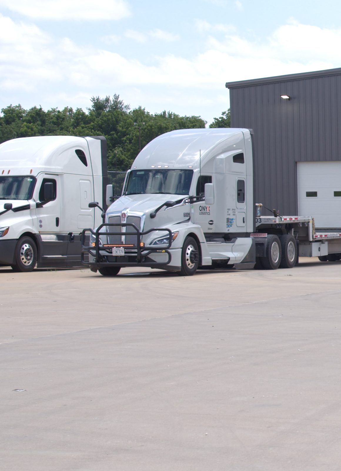A late-model Onyx Logistics truck at the yard